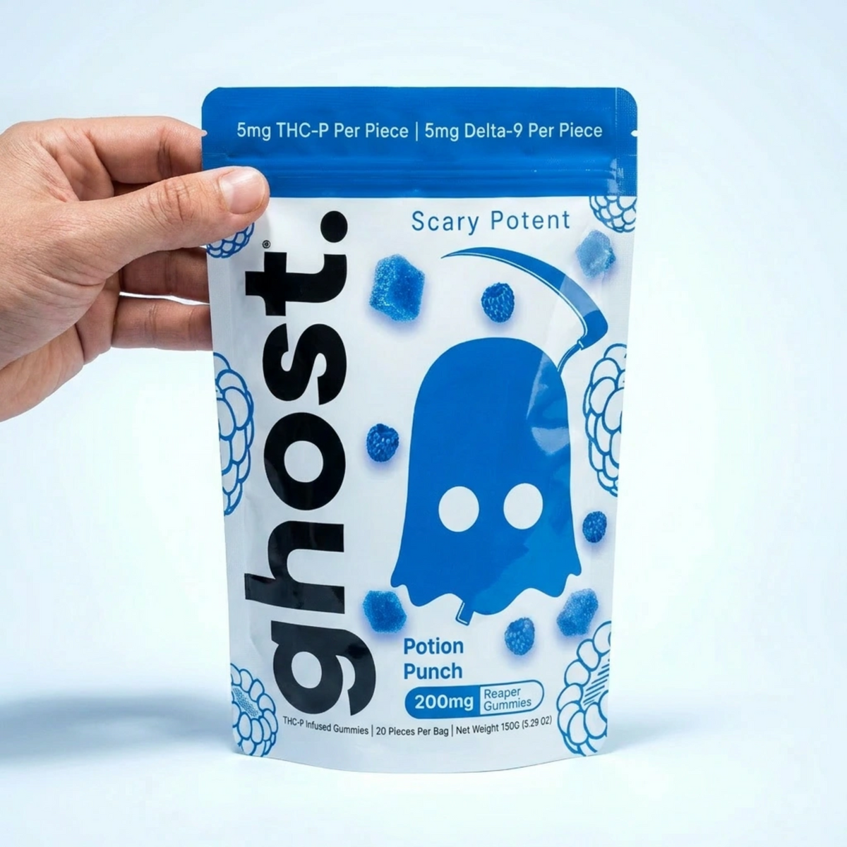 Hand holding a 'ghost.' Potion Punch package with blue ghost logo on a light blue background