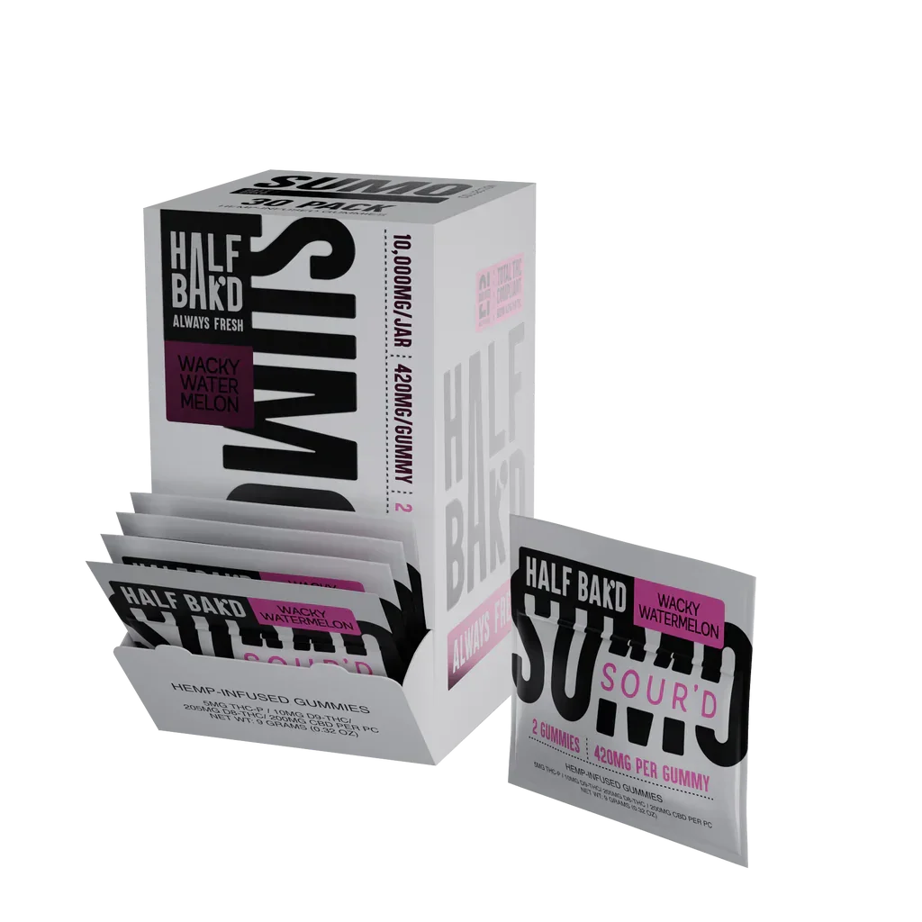 A silver packet labeled Half Bak’d Sumo Sour’d Gummies | 420mg (2ct) by Half Bak'd contains 2 hemp-infused gummies. The packaging features bold black and blue text on a white background.
